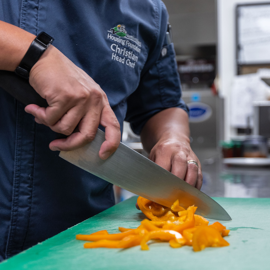 Head chef preparing food for residents