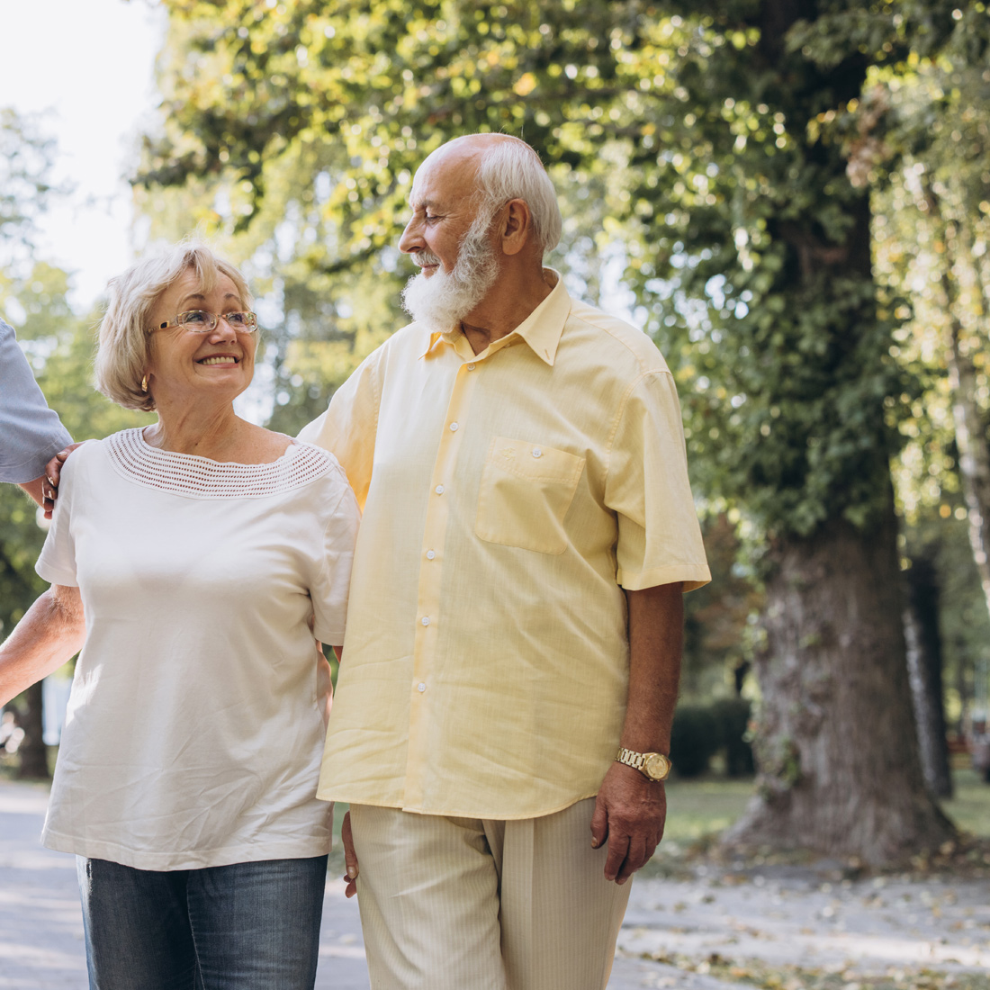 Seniors walking together outside